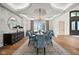 Formal dining room with tray ceiling, elegant chandelier, and stylish decor at 11101 Hawthorn Rdg, Fishers, IN 46037