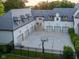 Large home with multiple garage spaces and a basketball court at 11101 Hawthorn Rdg, Fishers, IN 46037