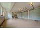 Spacious garage with built-in storage and multiple garage doors at 11101 Hawthorn Rdg, Fishers, IN 46037