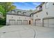 Large garage with multiple doors and a basketball court at 11101 Hawthorn Rdg, Fishers, IN 46037