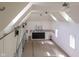 Spacious and bright indoor court with multiple windows and overhead lighting at 11101 Hawthorn Rdg, Fishers, IN 46037