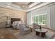 Stunning main bedroom with a sitting area, a decorative mural, and a stylish chandelier at 11101 Hawthorn Rdg, Fishers, IN 46037