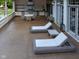 Inviting outdoor patio with wicker furniture and full kitchen at 11101 Hawthorn Rdg, Fishers, IN 46037