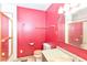 Bathroom features shower with glass door, toilet, and sink with mirror at 1113 Delray Dr, Indianapolis, IN 46241