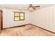 Spacious bedroom featuring a ceiling fan and window views at 1113 Delray Dr, Indianapolis, IN 46241