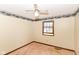 Bright bedroom with a ceiling fan and natural light from the window at 1113 Delray Dr, Indianapolis, IN 46241