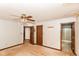 Bedroom showcasing multiple doorways and a ceiling fan at 1113 Delray Dr, Indianapolis, IN 46241