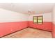 Bedroom features a ceiling fan, window, and two-tone wall paint at 1113 Delray Dr, Indianapolis, IN 46241