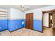 Bedroom featuring built-in shelving and a closet at 1113 Delray Dr, Indianapolis, IN 46241