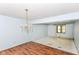 Bright living room with chandelier and large windows at 1113 Delray Dr, Indianapolis, IN 46241