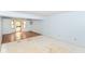 Spacious living room features wood and unfinished flooring and natural light at 1113 Delray Dr, Indianapolis, IN 46241