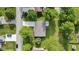 Aerial view of a well-maintained property with mature trees and a long driveway at 1121 Barcelona Dr, Greenwood, IN 46143