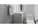 Bathroom featuring a vanity, framed mirror, and a toilet with a stylish design at 1121 Barcelona Dr, Greenwood, IN 46143