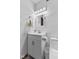 Bright bathroom featuring white vanity, modern fixtures, and a decorative mirror at 1121 Barcelona Dr, Greenwood, IN 46143