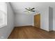 Large bedroom with hardwood floors, closet, and natural light at 1121 Barcelona Dr, Greenwood, IN 46143
