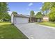 Attractive home with an attached two-car garage and long drive at 1121 Barcelona Dr, Greenwood, IN 46143