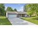 Inviting home with a long drive and attractive landscaping at 1121 Barcelona Dr, Greenwood, IN 46143