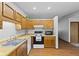 Wooden cabinets and a full set of appliances are the highlights of this great kitchen at 1121 Barcelona Dr, Greenwood, IN 46143