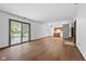Spacious living room with sliding glass doors and an open kitchen at 1121 Barcelona Dr, Greenwood, IN 46143