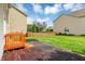 Nice backyard featuring a wooden deck and brick patio at 11849 Traymoore Dr, Fishers, IN 46038