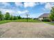 Outdoor basketball court view showcasing a full court setup, perfect for recreational games and activities in the community at 11849 Traymoore Dr, Fishers, IN 46038