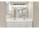 The bathroom has a vanity with double sinks and storage at 11849 Traymoore Dr, Fishers, IN 46038