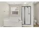 This bathroom features a tub, a shower, and a toilet at 11849 Traymoore Dr, Fishers, IN 46038