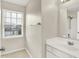 The bathroom has a window, a sink, a mirror, and a shower with a showerhead at 11849 Traymoore Dr, Fishers, IN 46038