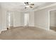 This large main bedroom has carpeted floors and multiple access points at 11849 Traymoore Dr, Fishers, IN 46038