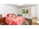 Comfortable bedroom showcasing a plush bed, natural light, and serene outdoor views at 1248 Hathaway Dr, Indianapolis, IN 46229