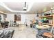 Spacious garage featuring ample storage, shelving, and a convenient access ramp at 1248 Hathaway Dr, Indianapolis, IN 46229