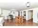 Large kitchen with island table, hardwood floors, stainless steel appliances and a pantry at 1248 Hathaway Dr, Indianapolis, IN 46229