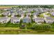 Neighborhood aerial view showcasing well-maintained homes, green lawns, and a Gathering-friendly community at 12672 Amber Star Dr, Noblesville, IN 46060