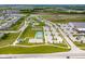 Aerial view of the community featuring Finch Creek Park, tennis courts, and a park at 12672 Amber Star Dr, Noblesville, IN 46060