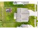 Aerial shot of a house, showcasing a large, green backyard with a play area at 12672 Amber Star Dr, Noblesville, IN 46060