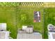 Aerial view of a fenced backyard featuring a well-maintained lawn and a play set at 12672 Amber Star Dr, Noblesville, IN 46060
