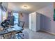 This is a view of a nice bedroom that is painted with light-purple and includes a black desk and a modern white closet at 12672 Amber Star Dr, Noblesville, IN 46060