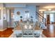 Cozy dining room featuring a wooden table with seating for eight and tasteful decor at 12672 Amber Star Dr, Noblesville, IN 46060