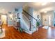 Charming entryway with staircase, decorative furniture, and ample natural light creating a welcoming atmosphere at 12672 Amber Star Dr, Noblesville, IN 46060