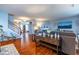Open-concept living room, showcasing the staircase and fireplace at 12672 Amber Star Dr, Noblesville, IN 46060