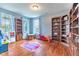 Inviting playroom with shelves, natural light, and ample space for activities and fun at 12672 Amber Star Dr, Noblesville, IN 46060