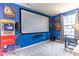 Home theater room featuring a projector screen and popcorn machine at 12672 Amber Star Dr, Noblesville, IN 46060