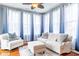 Bright and airy sunroom with comfortable seating, light color scheme and calming atmosphere at 12672 Amber Star Dr, Noblesville, IN 46060