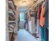 A well-organized walk-in closet with ample storage space showcases fashion and accessibility at 12672 Amber Star Dr, Noblesville, IN 46060