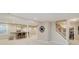 Finished basement with a carpeted floor, bar, and staircase leading to the upper level at 13218 Beckwith Dr, Carmel, IN 46074