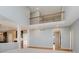 Open floor plan featuring a spacious living room, with vaulted ceilings at 13218 Beckwith Dr, Carmel, IN 46074
