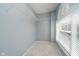 A walk-in closet with wire shelving and a window for natural light at 13218 Beckwith Dr, Carmel, IN 46074