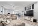 Spacious living room featuring a plush sectional sofa and an open layout at 13321 N White Cloud Ct, Camby, IN 46113