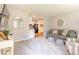 Spacious living room with open layout, neutral decor, and comfortable seating arrangement at 1398 Clinton St, Noblesville, IN 46060