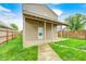Backyard featuring a covered patio area perfect for outdoor dining at 148 S 3Rd Ave, Beech Grove, IN 46107